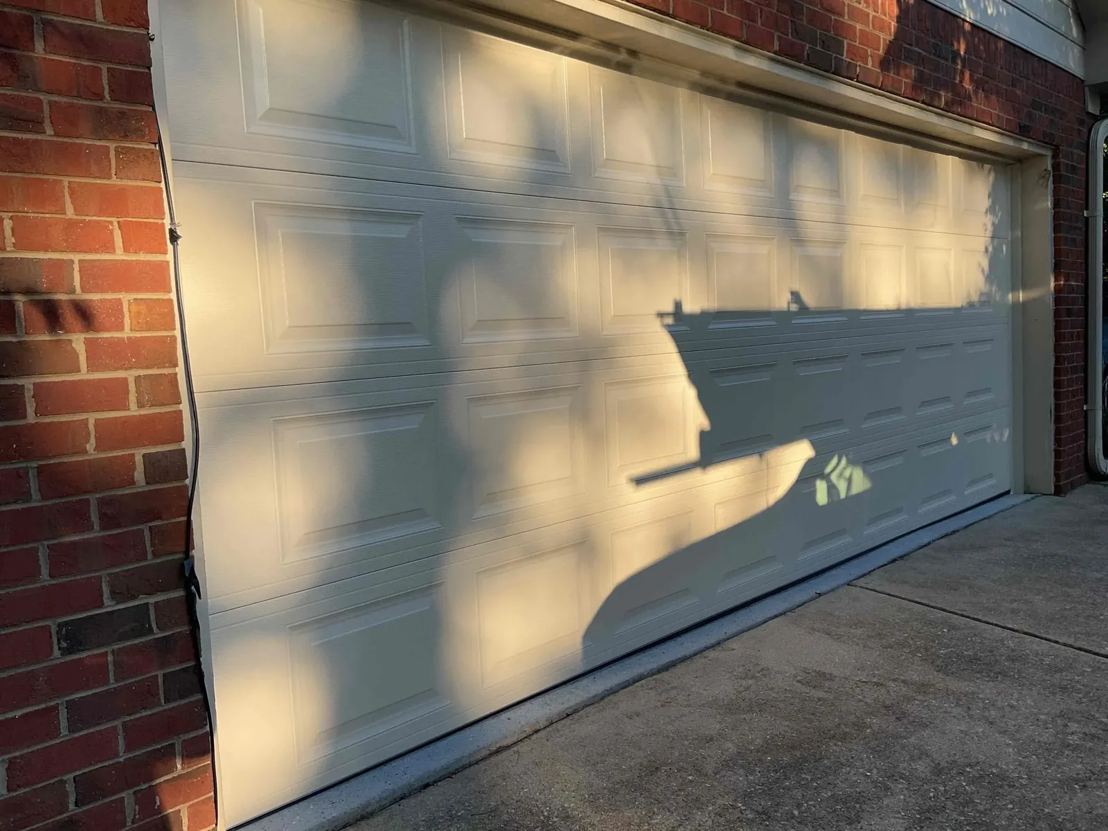 Completed garage door installation on a residential home